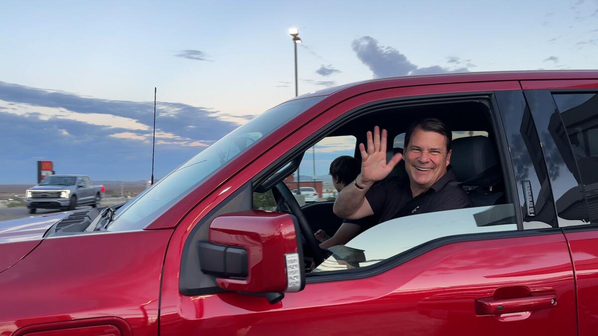 Jim Farley and son head off on the next leg of their road trip.