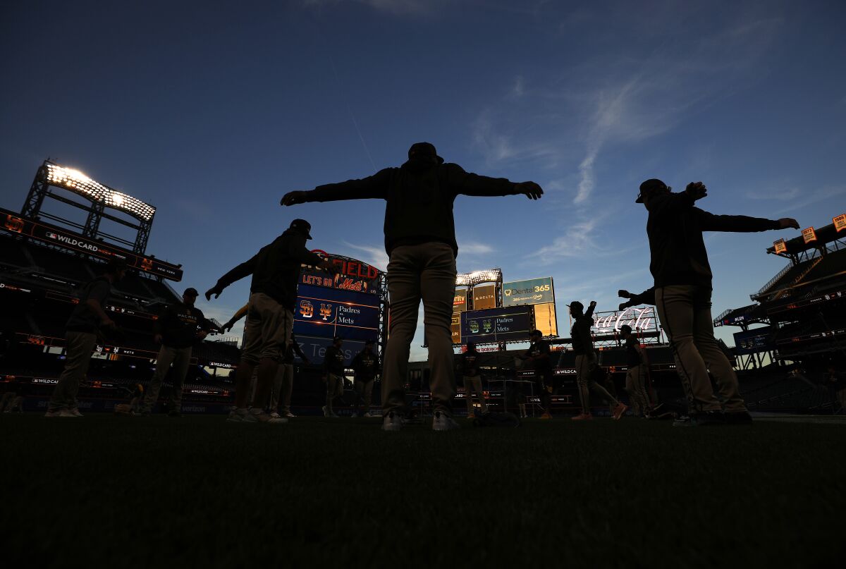 The Padres stretch before a workout Thursday at Citi Field in advance of the National League wild card series 
