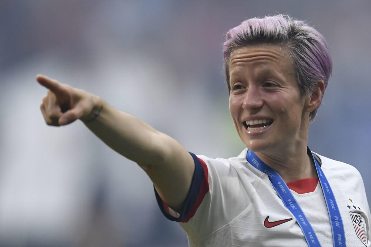 United States' forward Megan Rapinoe celebrates after the France 2019 Womens World Cup football final match between USA and the Netherlands, on July 7, 2019, at the Lyon Stadium in Lyon, central-eastern France.