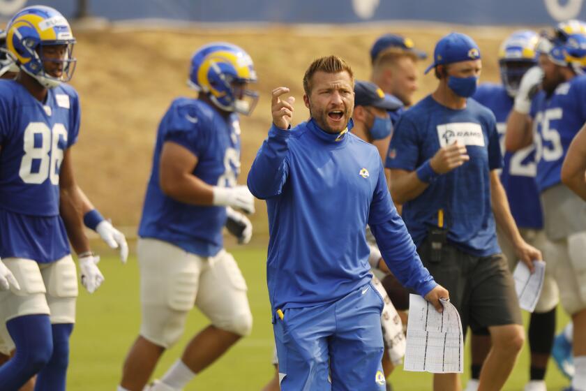 THOUSAND OAKS, CA - AUGUST 18: Los Angeles Rams head coach Sean McVay works with players as the team conducts practice at the Rams training facility in Thousand Oaks on Tuesday August 18, 2020 in preparation for the 2020 National Football League season. Ventura County on Tuesday, Aug. 18, 2020 in Thousand Oaks, CA. (Al Seib / Los Angeles Times