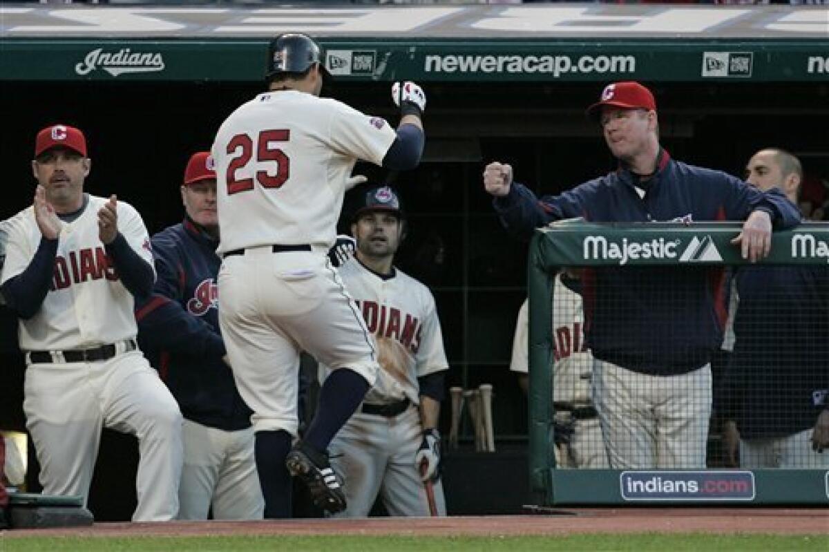 Cleveland Indians' Grady Sizemore, right, is congratulated by