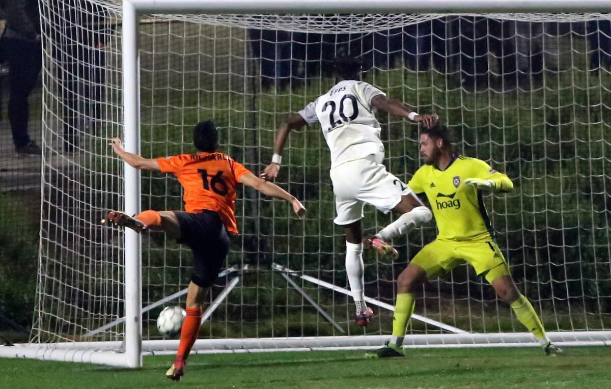 San Antonio FC's Marcus Epps heads in a goal to tie the score at 1-1 against Orange County Soccer Club.