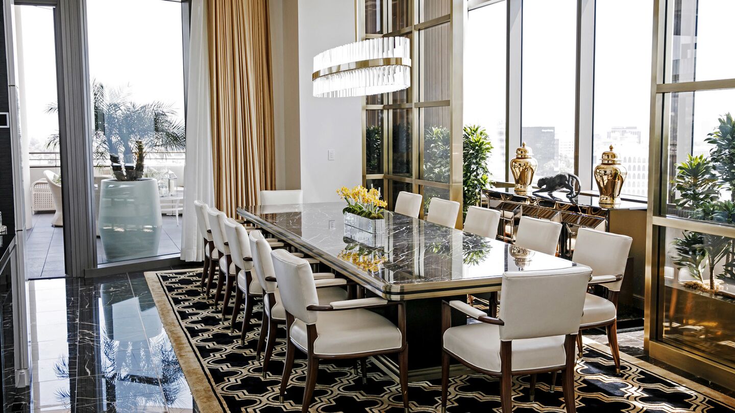 The Presidential Suite at the Waldorf Astoria Beverly Hills is often rented out for business meetings. The dinning room table can seat 12 people.