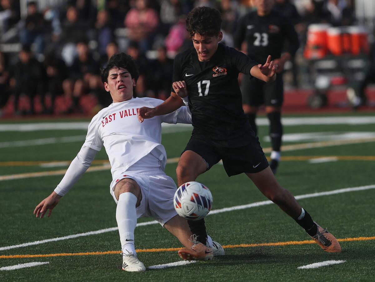 Los Amigos' Julian Rivera (17) steals the ball from Redlands East Valley's Landon Garcia on Wednesday.