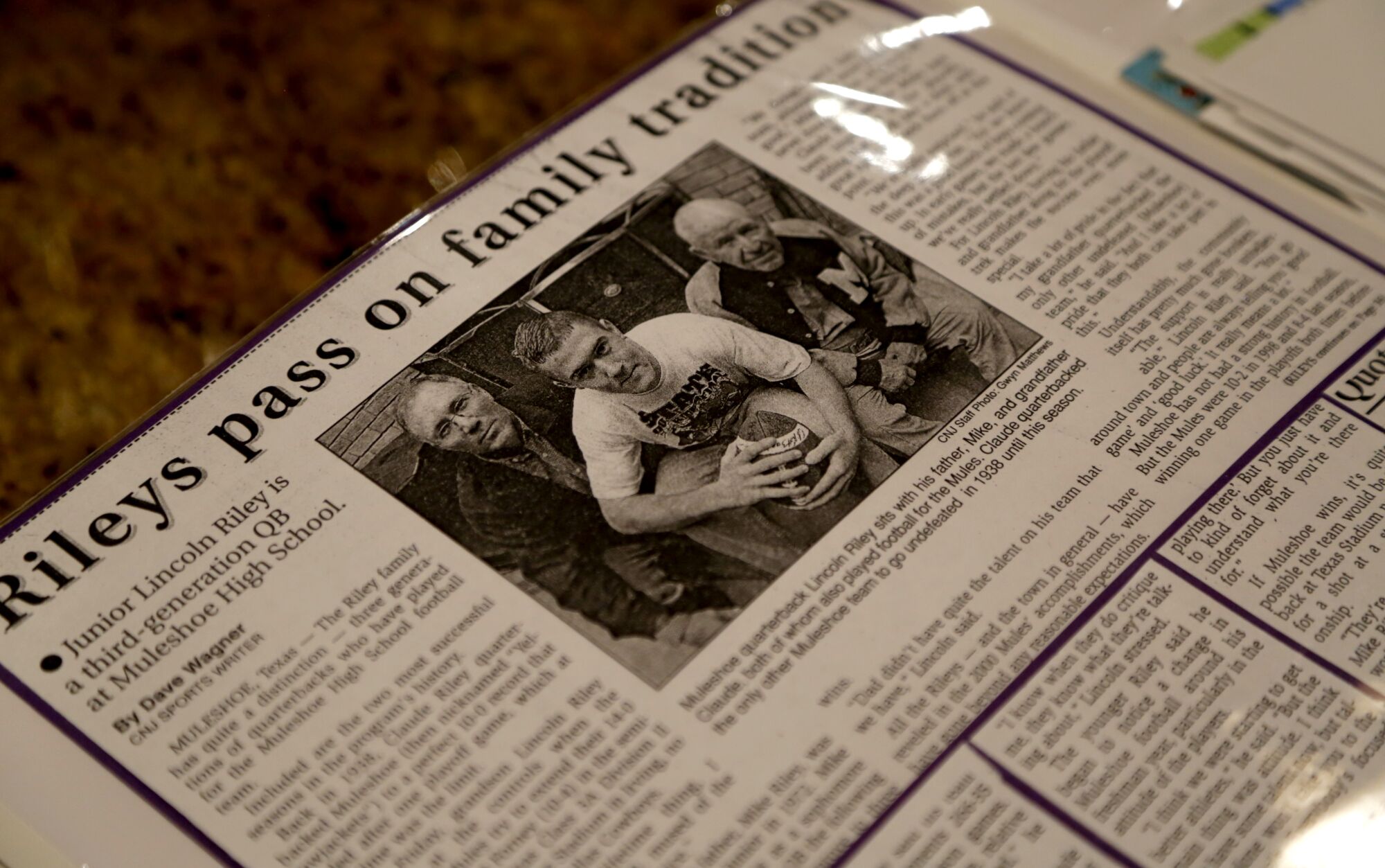 A Clovis News Journal article about USC coach Lincoln Riley during his high school days is on display at his parent's home