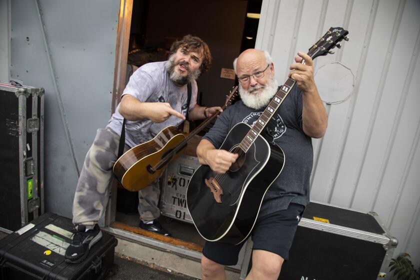 NORTH HOLLYWOOD, CA - OCTOBER 03, 2018 - Tenacious D, the comedy rock duo with actors Jack Black, Lt, and Kyle Gass, outside their studio, October 03, 2018. (Ricardo DeAratanha / Los Angeles Times)