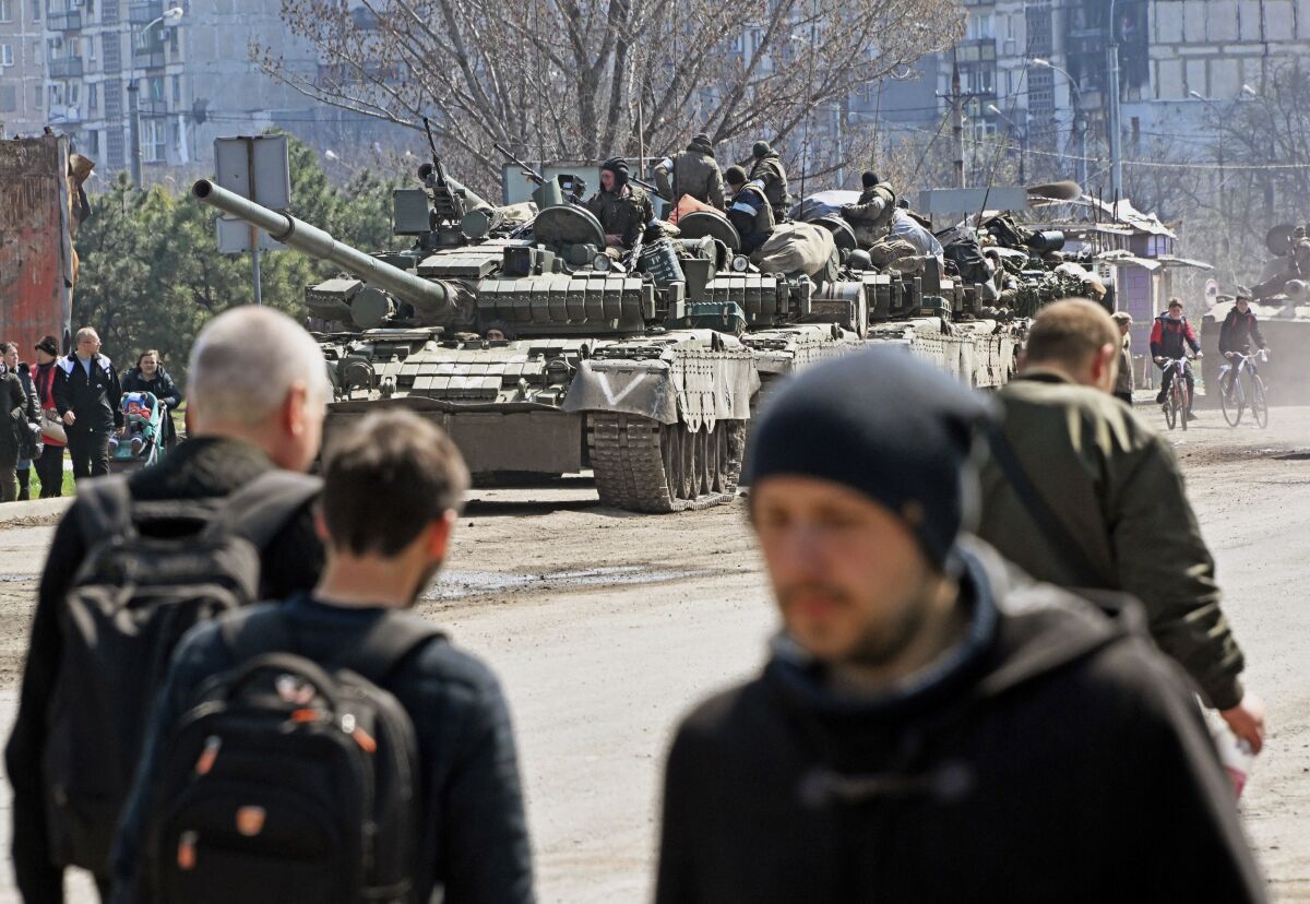 Tanks with Russian soldiers on the streets of Mariupol, Ukraine.