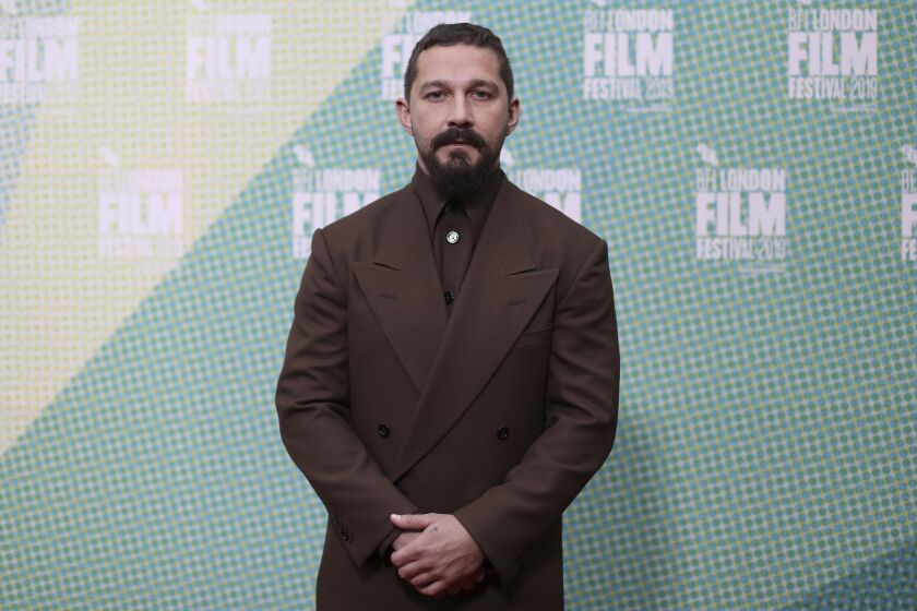 FILE - In this Oct. 3, 2019 file photo, Shia LaBeouf poses for photographers at the premiere of "The Peanut Butter Falcon" during the London Film Festival. LaBeouf turns 34 on June 11. (Photo by Vianney Le Caer/Invision/AP, File)