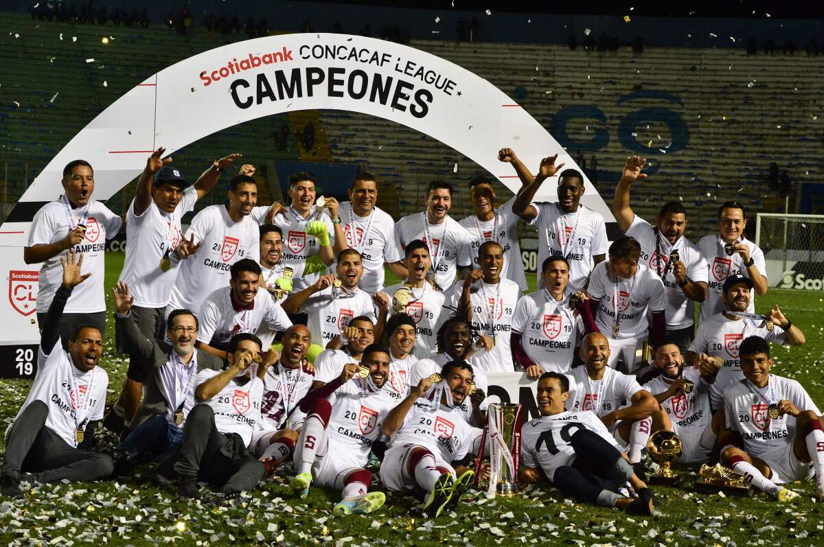 Saprissa team celebrate as they become Champions of the Concacaf League after the Concacaf League final match against Motagua at the National stadium, in Tegucigalpa, on November 26, 2019. (Photo by ORLANDO SIERRA / AFP) (Photo by ORLANDO SIERRA/AFP via Getty Images) ** OUTS - ELSENT, FPG, CM - OUTS * NM, PH, VA if sourced by CT, LA or MoD **