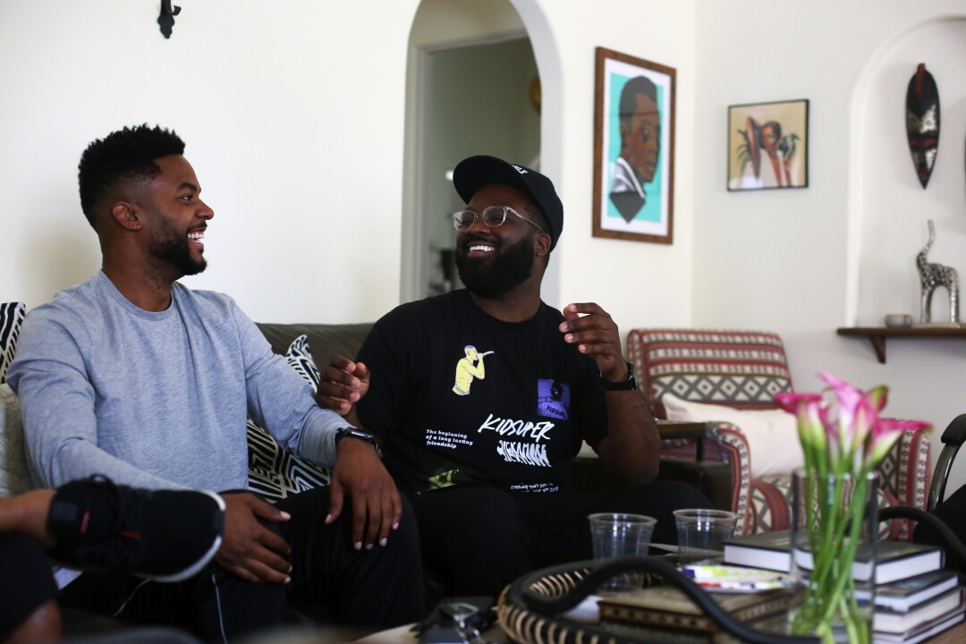 Image result for black men form book club after nipsey hussle death"