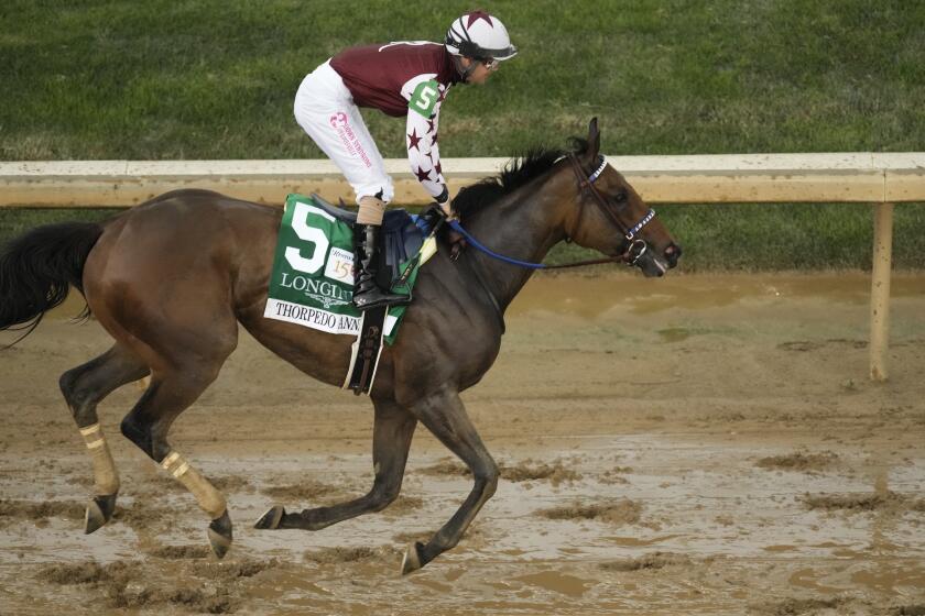 Brian Hernandez Jr. rides Thorpedo Anna to win he 150th running of Kentucky Oaks horse race at Churchill Downs Friday, May 3, 2024, in Louisville, Ky. (AP Photo/Charlie Riedel)