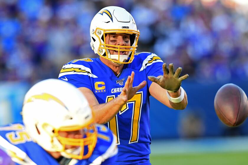 CARSON, CA - DECEMBER 15: Quarterback Philip Rivers #17 of the Los Angeles Chargers takes the snap in the second half against the Minnesota Vikings at Dignity Health Sports Park on December 15, 2019 in Carson, California. (Photo by Jayne Kamin-Oncea/Getty Images)