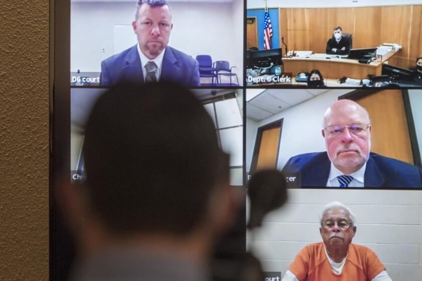 FILE - In this April 15, 2021, file photo defendants Paul Flores, top left, and his father, Ruben Flores, bottom right, appear via video conference during their arraignment in San Luis Obispo Superior Court in San Luis Obispo, Calif. The father and son were arrested in connection with the 1996 disappearance of Kristin Smart, a college student at California Polytechnic University San Luis Obispo. Paul Flores is charged with murder and his father, Ruben Flores, is charged as an accomplice for allegedly helping him bury her body. The two have pleaded not guilty. San Luis Obispo prosecutors say Paul Flores killed Smart while trying to rape her in his dorm room in May 1996 when they were freshmen students. The trial has been moved to Monterey County Superior Court in Salinas for Monday, July 18, 2022. (AP Photo/Nic Coury, File)