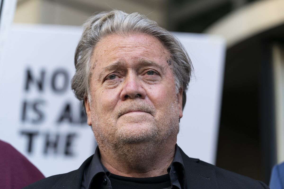 Former White House strategist Steve Bannon, pauses as he departs federal court on Friday, July 22, 2022, in Washington. 