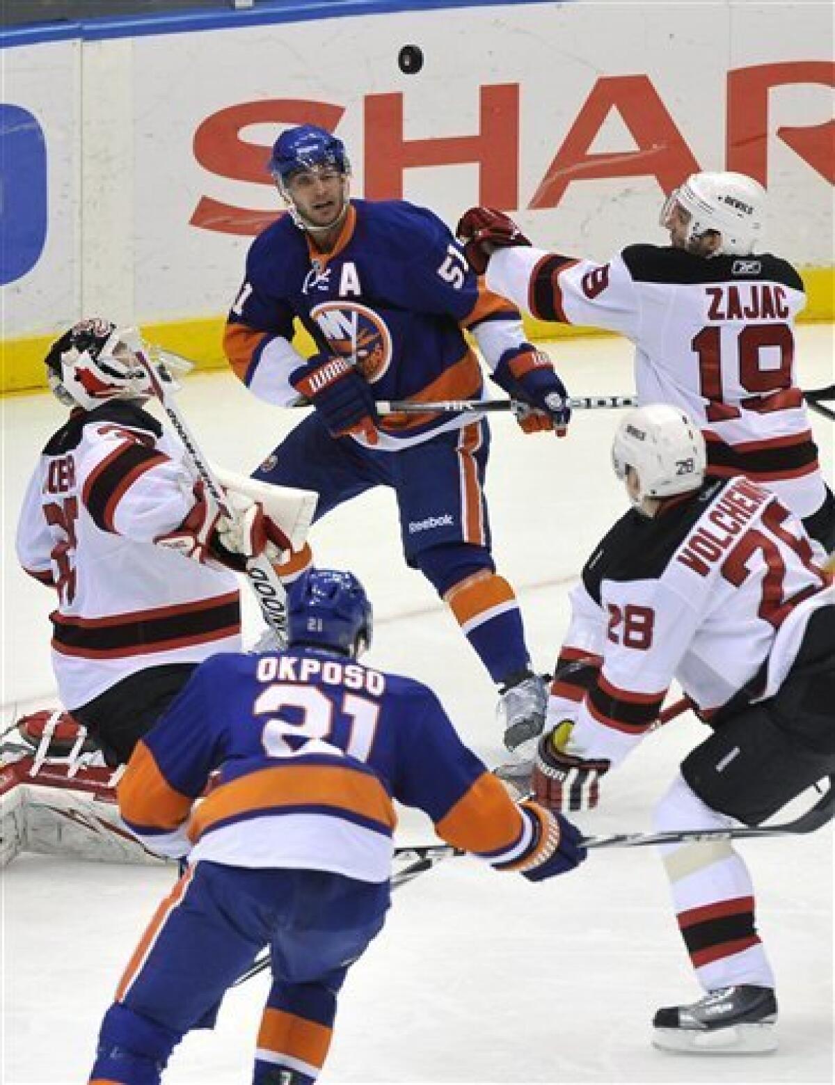 New York Islanders Frans Nielsen (51) and Josh Bailey react after
