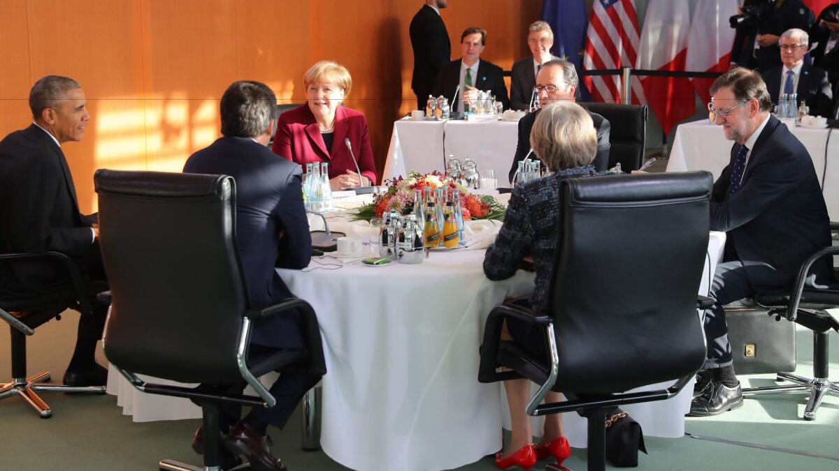 President Obama, left, met Friday in Berlin with European leaders including, second from left, Italian Prime Minister Matteo Renzi, German Chancellor Angela Merkel, French President Francois Hollande, British Prime Minister Theresa May and Spanish Prime Minister Mariano Rajoy.