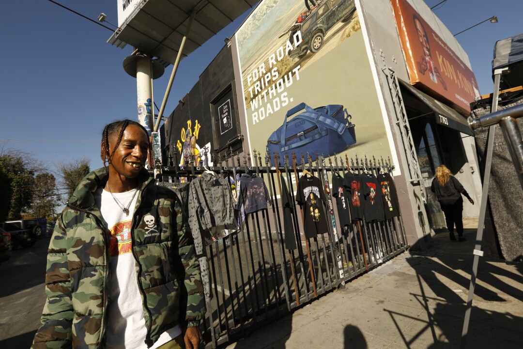 Joshua Jones, owner of Dead Hom!ies clothing, says his business is always good on Melrose Avenue.