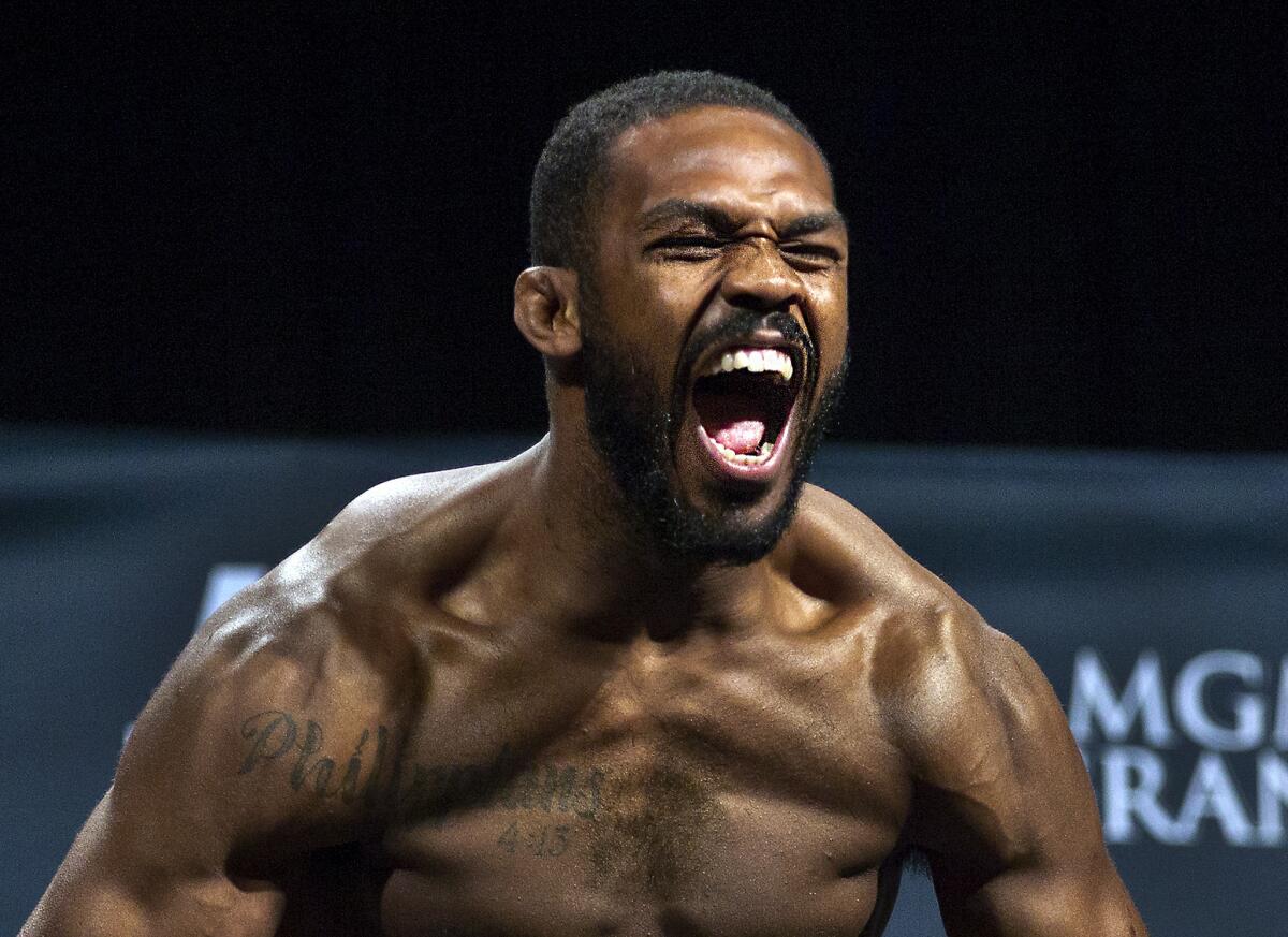 Jon Jones screams during weigh-ins for his UFC light-heavyweight championship fight.