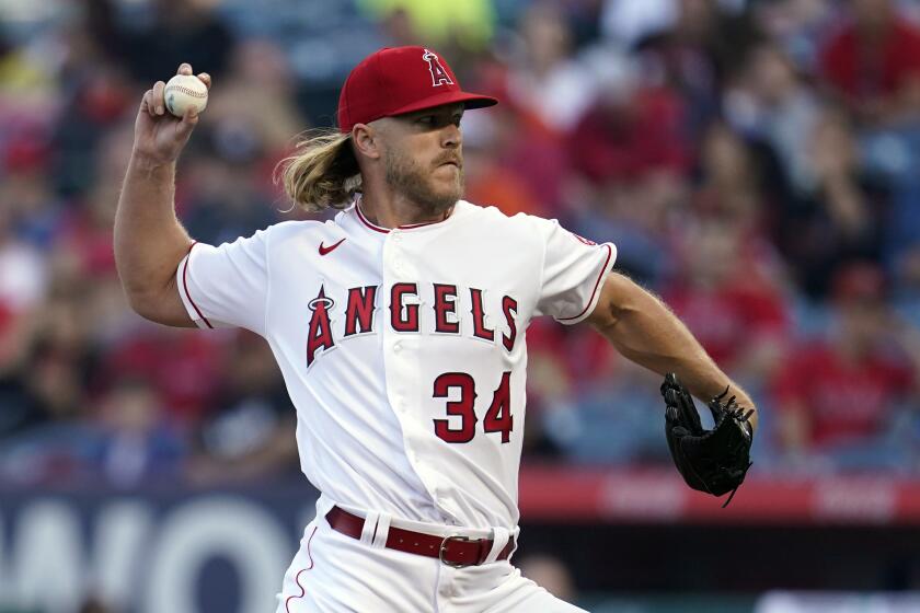Angels starter Noah Syndergaard pitches during the first inning April 23, 2022, in Anaheim.