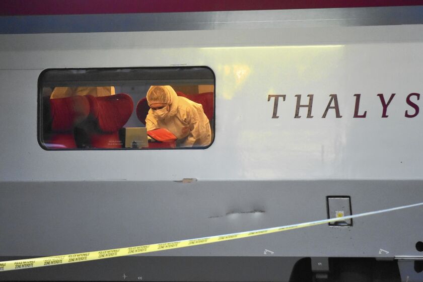 Police inspect a high-speed Thalys train after three Americans thwarted an attack during a trip from Amsterdam to Paris.