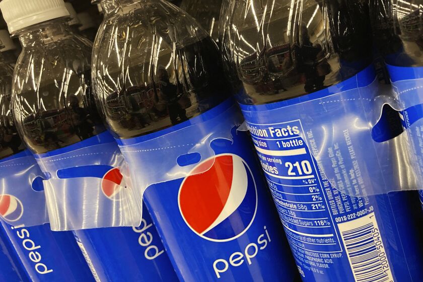 Bottles of Pepsi are displayed in a grocery store, Ill., Thursday, Feb. 10, 2022. PepsiCo reports their corporate results on Thursday, Feb. 9, 2023. (AP Photo/Nam Y. Huh)