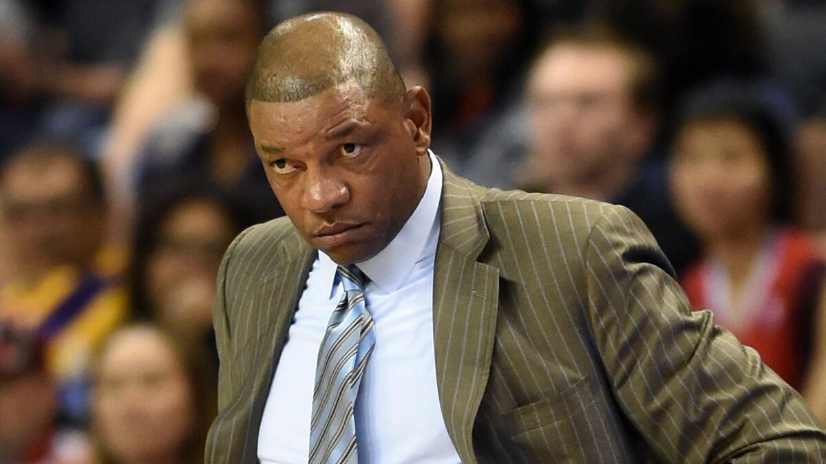 Clippers Coach Doc Rivers looks on during an exhibition loss to the Denver Nuggets on Oct. 18.