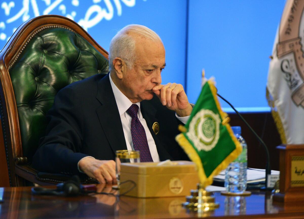 Arab League Secretary-General Nabil Elaraby looks on during a news conference at the end of the organization's summit in Kuwait.