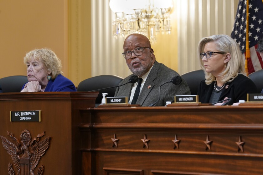 House Jan. 6 Select Committee Chairman Bennie Thompson, D-Miss., center, flanked by Rep. Zoe Lofgren, D-Calif., left, and Vice Chair Liz Cheney, R-Wyo., meet to vote on pursuing contempt charges against Jeffrey Clark, a former Justice Department lawyer who aligned with former President Donald Trump as Trump tried to overturn his election defeat, at the Capitol in Washington, Wednesday, Dec. 1, 2021. (AP Photo/J. Scott Applewhite)