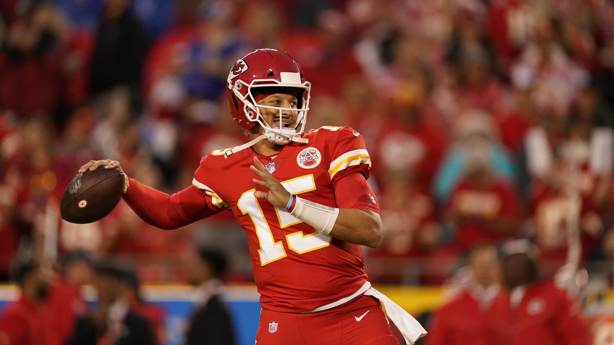 Kansas City Chiefs quarterback Patrick Mahomes warms up before a game.