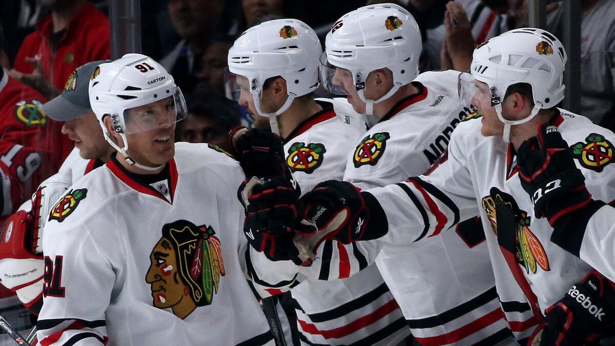 Chicago Blackhawks forward Brad Richards celebrates with his teammates after scoring a goal during the second period of a 4-1 win over the Kings at Staples Center on Saturday.