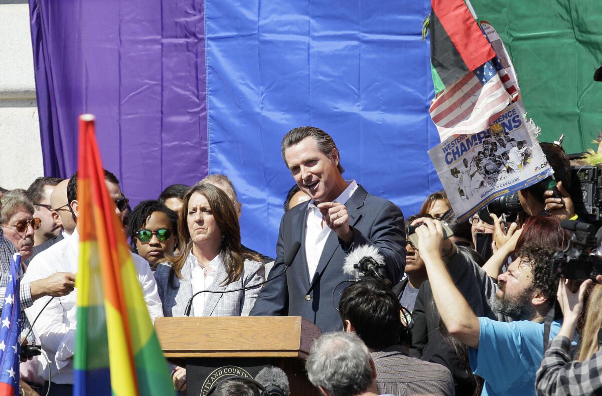 Lt. Gov. and former San Francisco Mayor Gavin Newsom speaks at a celebration outside City Hall on Friday after the Supreme Court approved gay marriage.