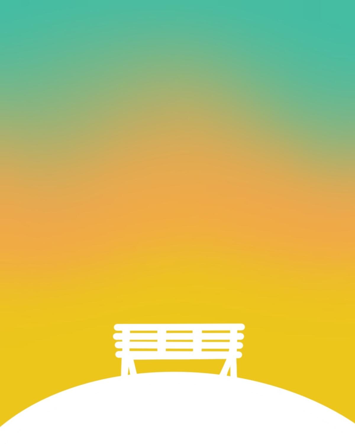 Silhouette of a park bench against a gradient of colors mimicking a sunrise.