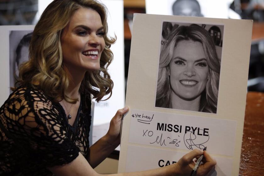LOS ANGELES, CA - JANUARY 27, 2017 -2501166_la-et-ms-sag-roll-out_ALS. Missi Pyle from Captain Fantastic signs her seat card used for rehearsals on Friday morning at the 23rd annual Screen Actors Guild Awards Ceremony kickoff event, Red Carpet Roll-Out & Gala Behind-the-Scenes, event for before the show this Sunday. (Al Seib / Los Angeles Times)