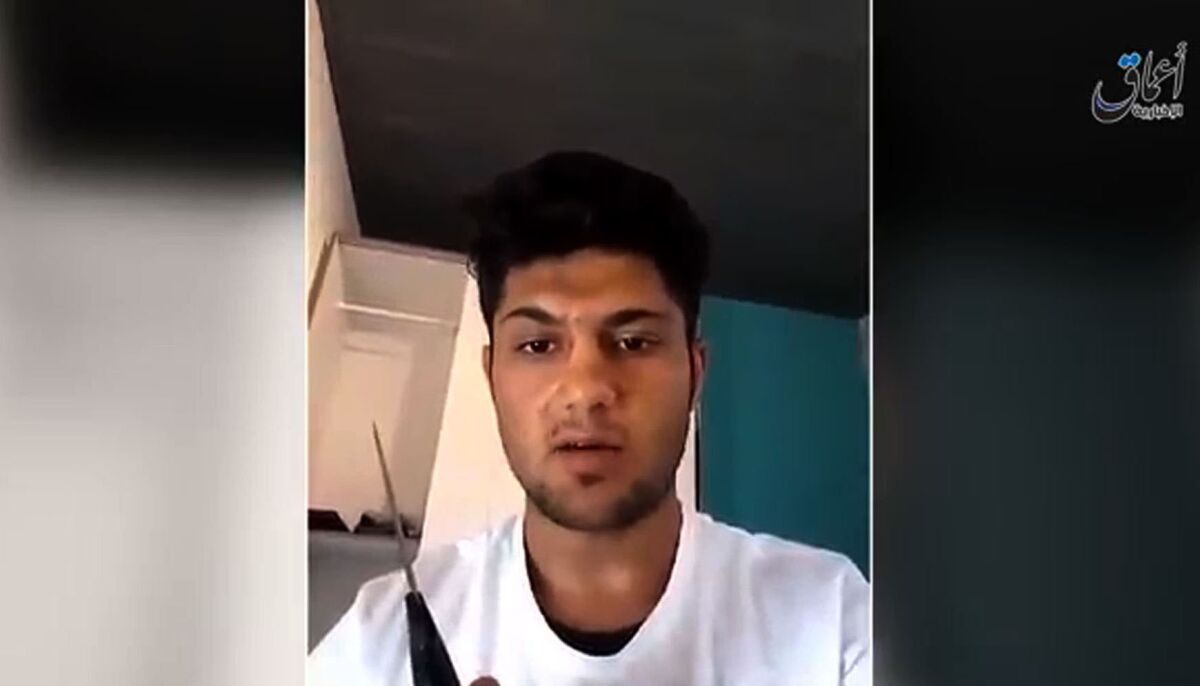 A still from a video released July 19, 2016, by the Amaq News Agency, an online service affiliated with the militant group Islamic State, purports to show the Afghan refugee who carried out a stabbing attack on a German train.