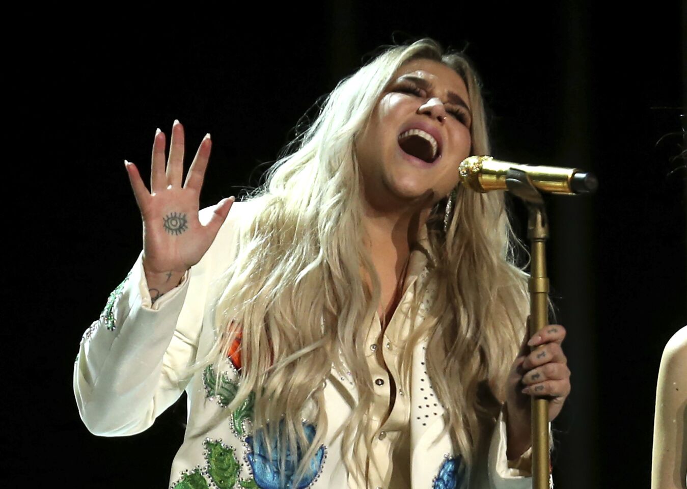 Kesha performs at the 60th Grammy Awards at Madison Square Garden in New York on Sunday.