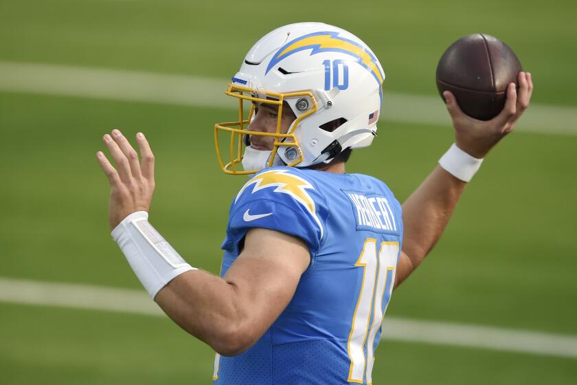 Los Angeles Chargers quarterback Justin Herbert throws against the Denver Broncos.