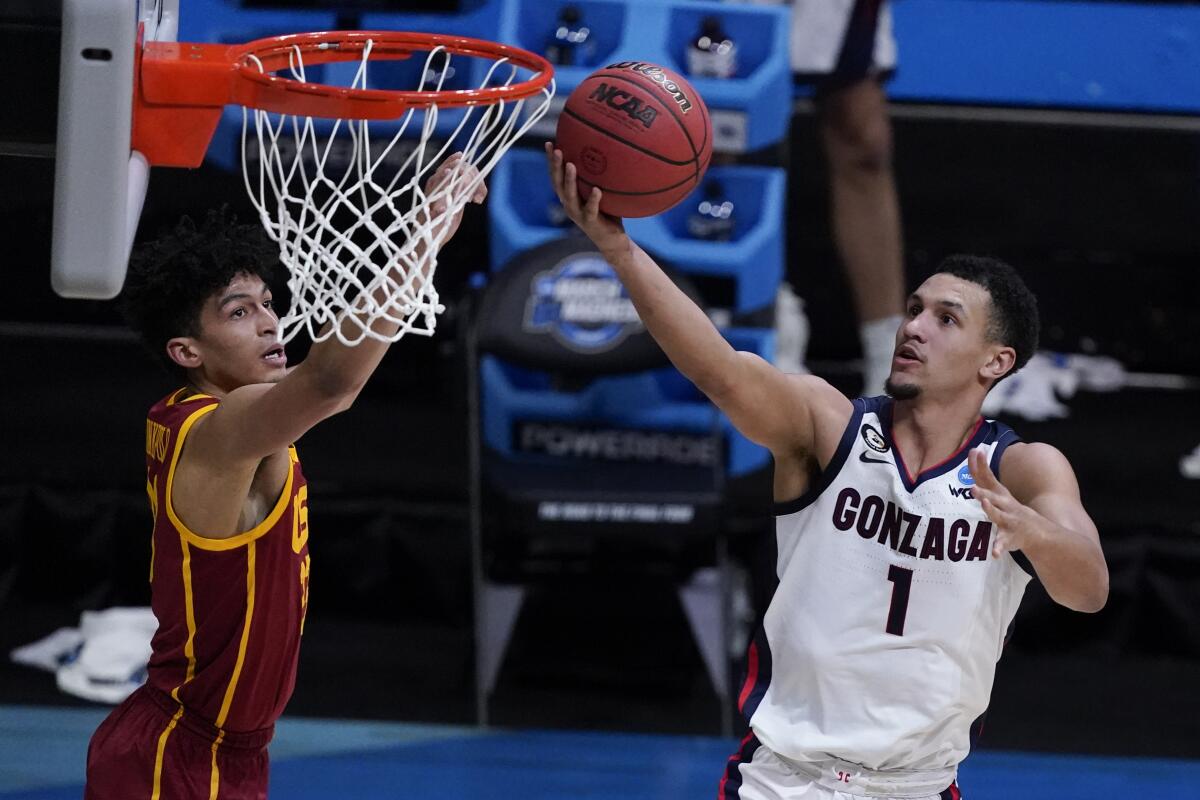 Gonzaga guard Jalen Suggs drive for a layup against USC.
