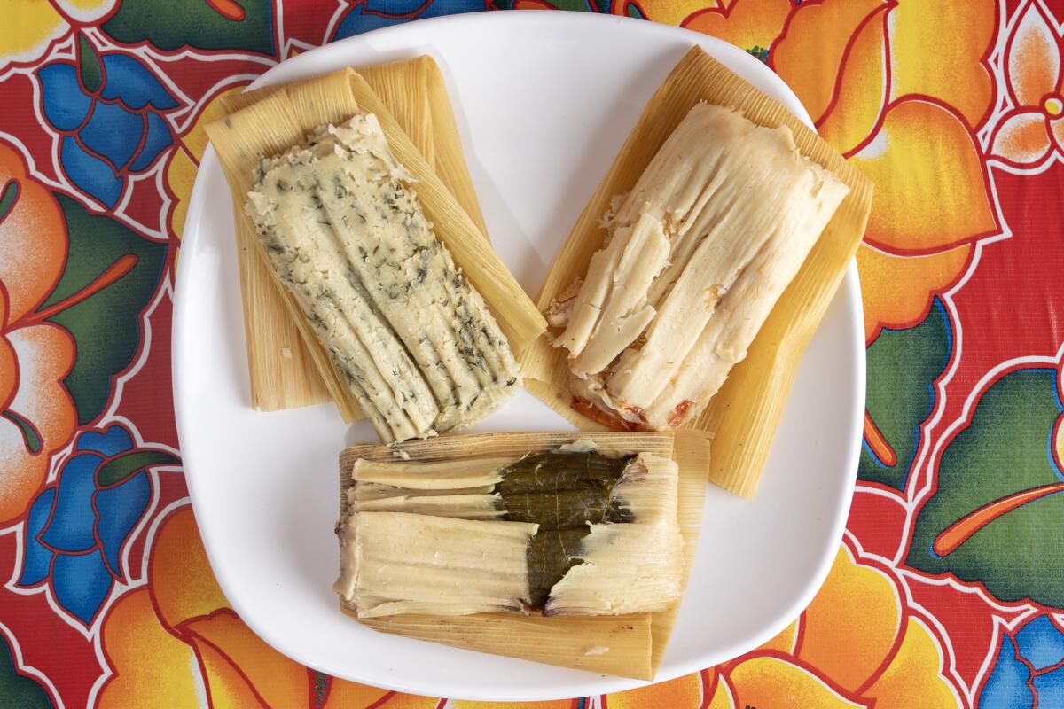 Chepil tamale, upper left; chicken and bean tamales at Sabores Oaxaquenos.