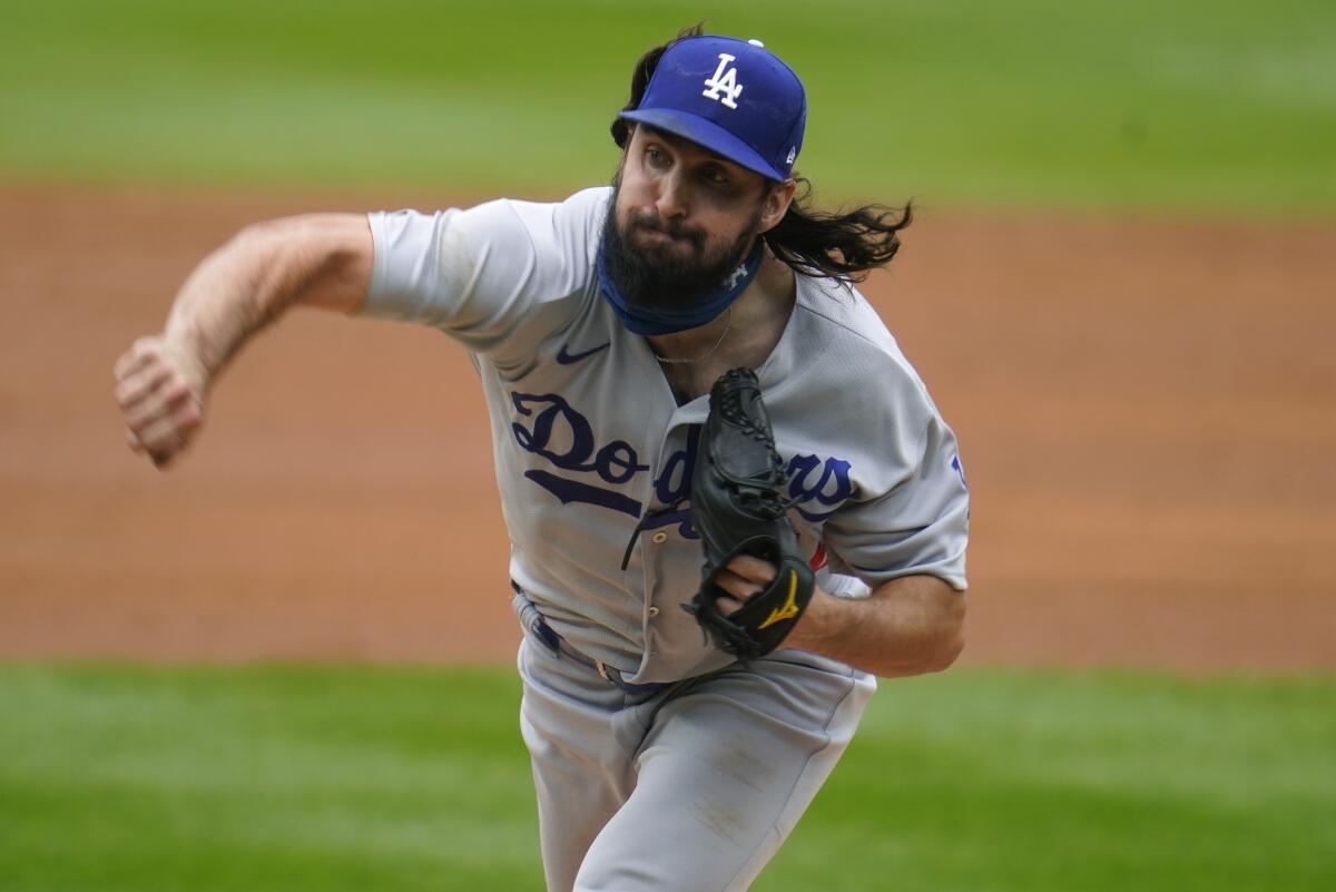 Dodgers starting pitcher Tony Gonsolin delivers during the first inning against the Colorado Rockies.