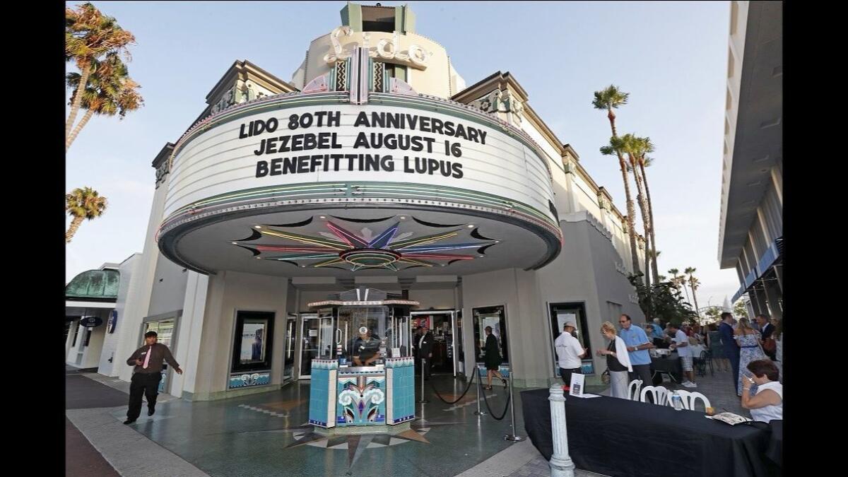 The Lido Theater in Newport Beach presented an 80th-anniversary celebration Thursday, including an outdoor reception and a screening of the Bette Davis film “Jezebel,” the first movie that played at the theater when it opened in 1938.