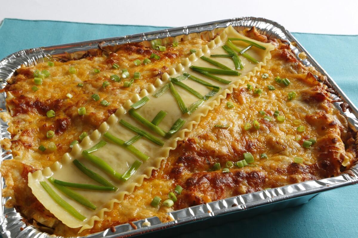 Inchezonya is a mash-up of Mexican enchilada casserole and lasagna. The banner on top makes it party-worthy. Recipe: Inchezonya