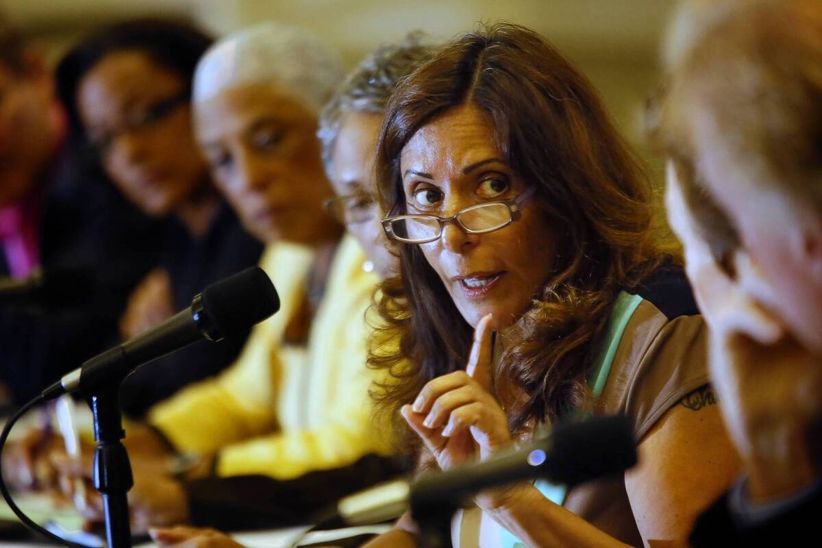 California Science Center board member Irene M. Romero stresses a point during the museum's board meeting.