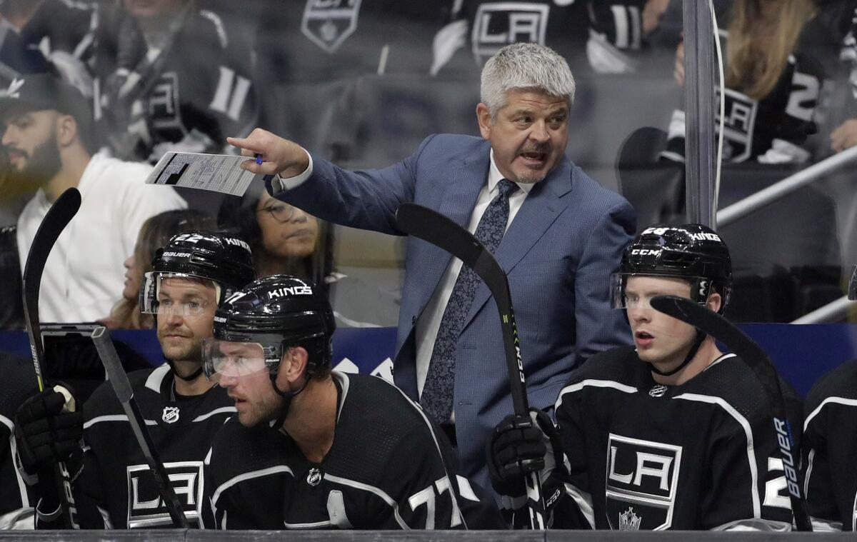 Kings coach Todd McLellan talks to his players during a preseason game in September.