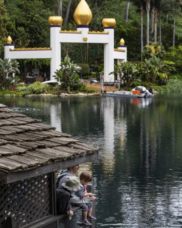 The Golden Lotus Archway stands across the water at Self-Realization Fellowship Lake Shrine. 