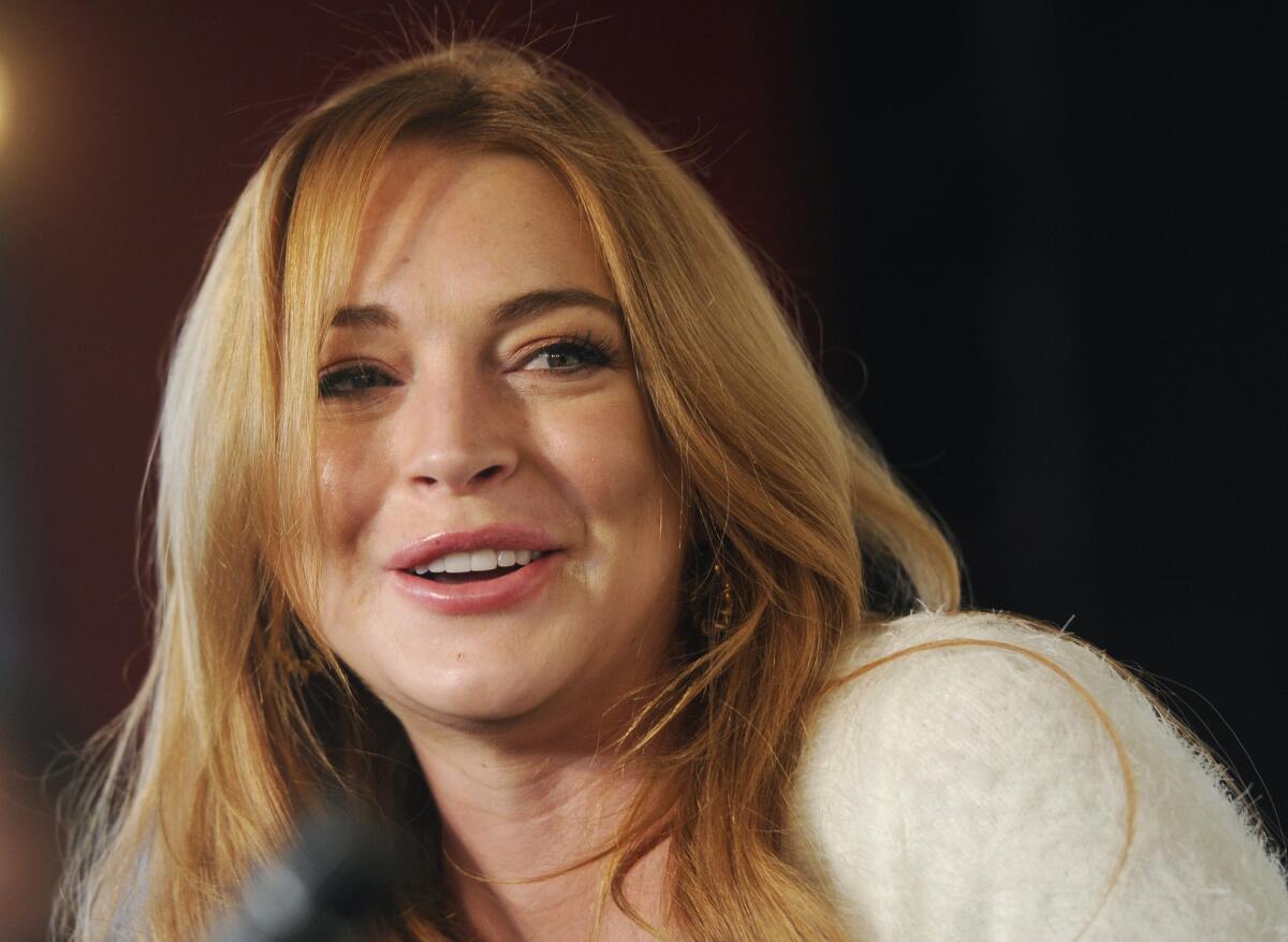 Lindsay Lohan, shown addressing reporters at the Sundance Film Festival in Park City, Utah, in January, has a new docu-series coming out Sunday.