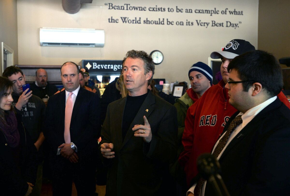 Sen. Rand Paul speaks with diners at Beantowne Coffee House & Cafe on March 21 in Hampstead, New Hampshire. Paul has made a number of trips to the state, which holds the first primary in the nation.