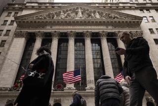 People walk past the New York Stock Exchange, Monday, Dec. 11, 2023, in New York. Stocks drifted higher in afternoon trading Monday on Wall Street ahead of the Federal Reserve’s last meeting of the year. (AP Photo/Yuki Iwamura)