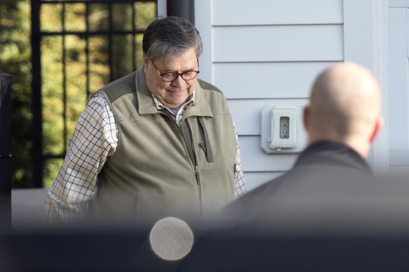 Attorney General William Barr leaves his home in McLean, Va., on Sunday morning, March 24, 2019. Barr is preparing a summary of the findings of the special counsel investigating Russian election interference. The release of Barr's summary of the report's main conclusions is expected sometime Sunday.(AP Photo/Sait Serkan Gurbuz)