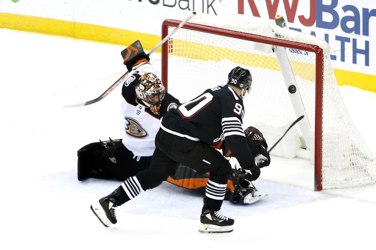The Devils' Tomas Tatar scores against Ducks goalie Anthony Stolarz during the shootout March 12, 2022.