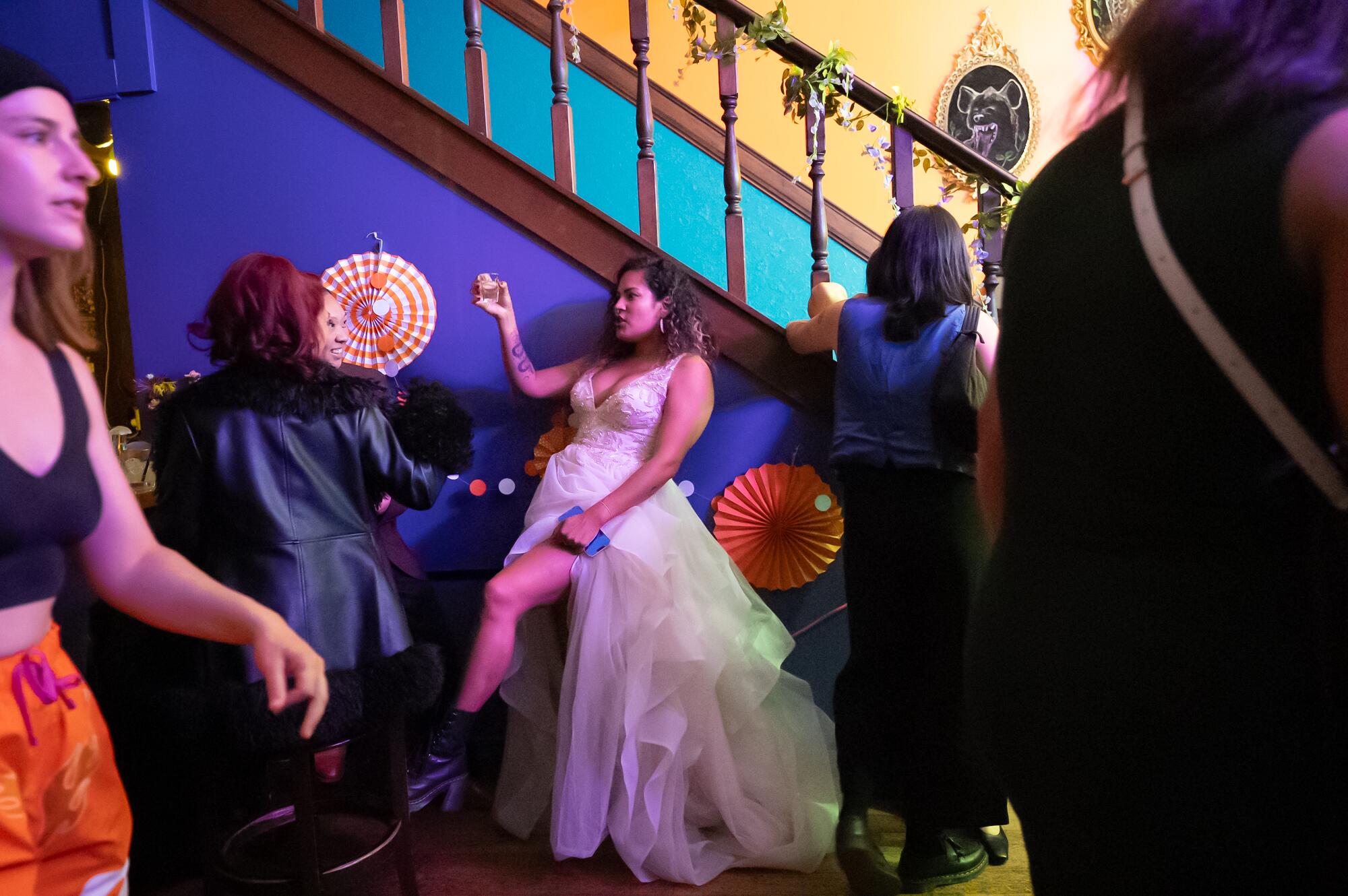 Dom Avarela wears a wedding dress during Queer Prom night.